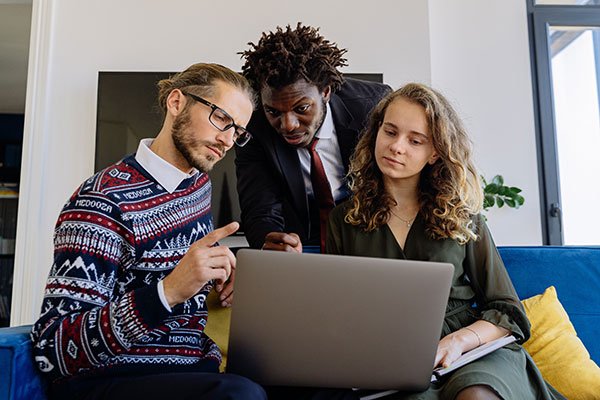 three people reading about translation errors in marketing 